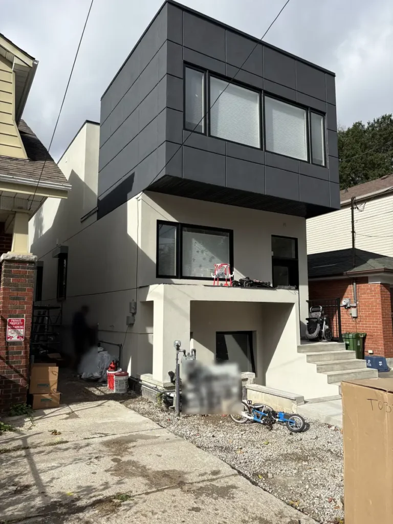 New build home in Toronto where TBC Garage Doors installed fire-rated window shutters