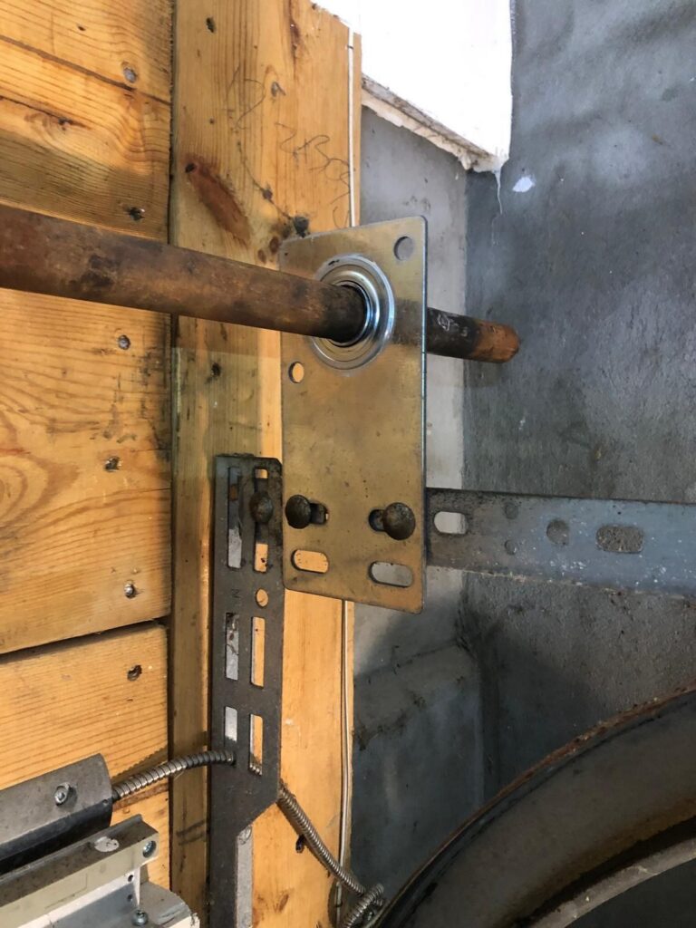 Garage door cable and drum repair by TBC Garage Doors in Toronto