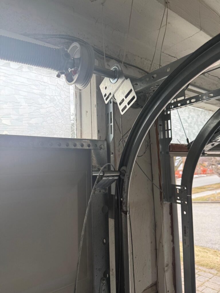 Garage door cable and drum repair by TBC Garage Doors in Toronto