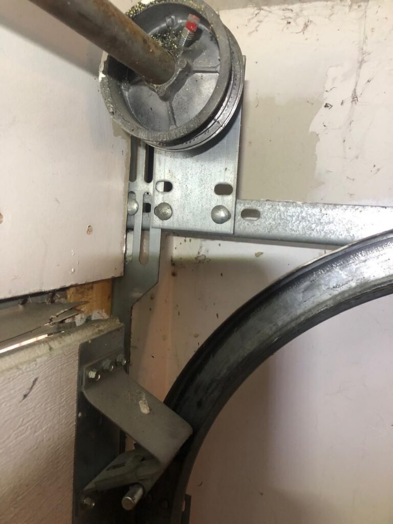 Garage door cable and drum repair by TBC Garage Doors in Toronto
